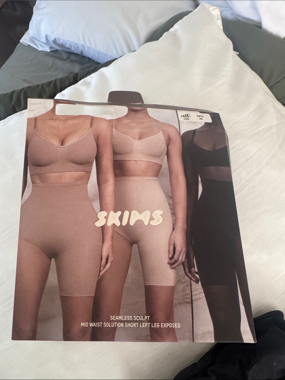 SKIMS Seamless Sculpt Mid-Waist Short in Nude and Mocha